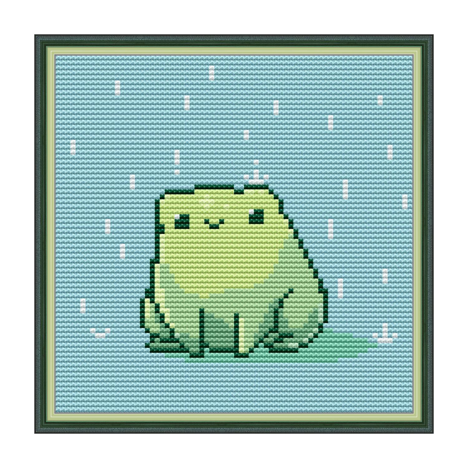 Frog cross stitch kit, cute pixel-style green frog with raindrop background in a green frame