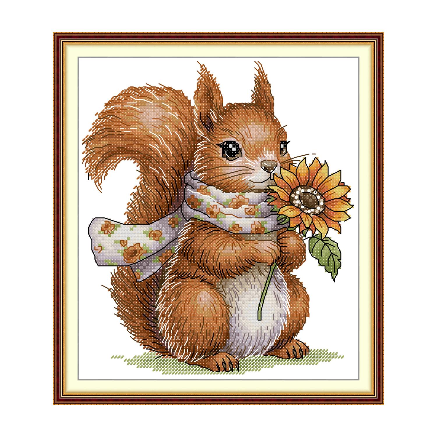 Squirrel cross stitch design of a squirrel wearing a floral scarf and holding a sunflower
