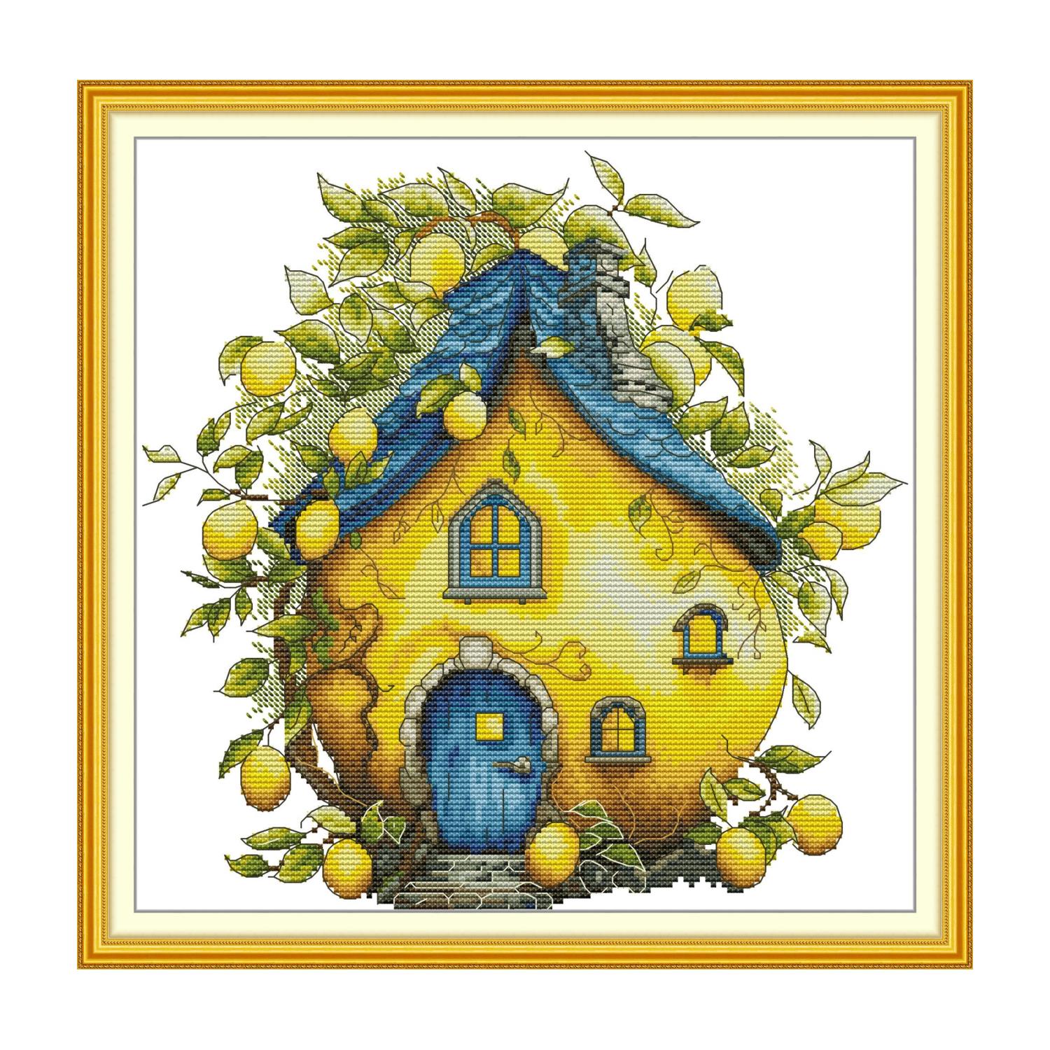 Country cottage cross stitch design of a whimsical lemon-shaped house with a blue roof, surrounded by lemon tree branches