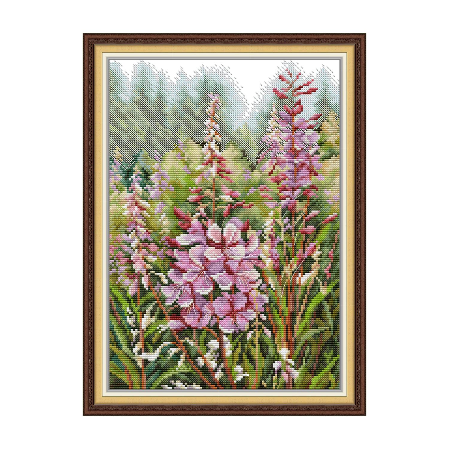 Wildflower cross stitch design of pink spike flowers blooming in a green meadow with a misty forest background